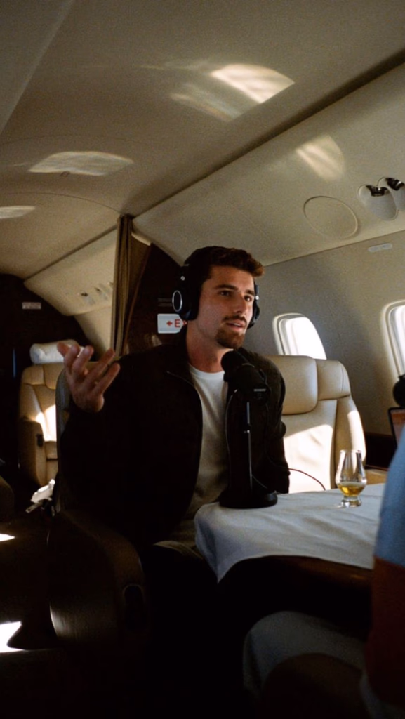 man sitting in a private jet